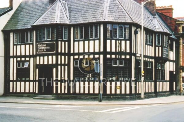 National Westminster Bank, Llanidloes – Iconic Black & White Timber-Framed Building Print