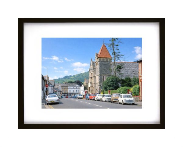 1970s street scene Crickhowell Powys Wales with vintage cars and historic buildings