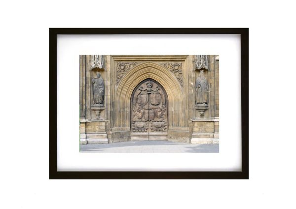 Bath Abbey historic carved entrance doors and Gothic stone archway