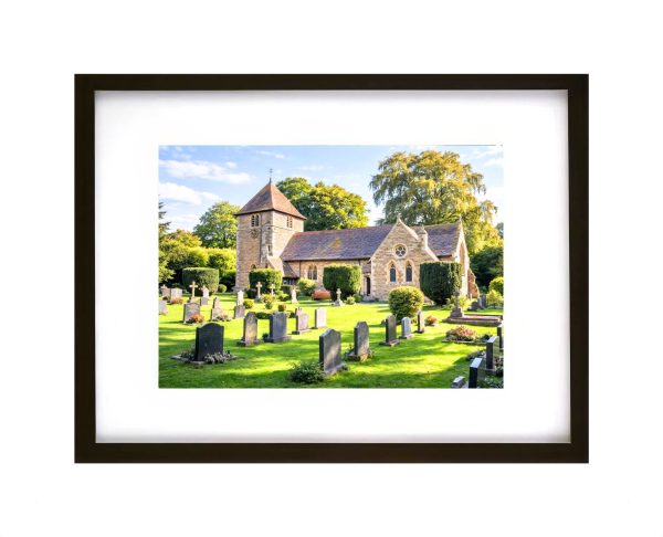 St Andrew’s Church Bredenbury Herefordshire with historic stone building and churchyard gravestones in summer sunlight