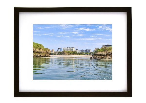 View looking back towards Tenby Pembrokeshire with beach and coastal town buildings